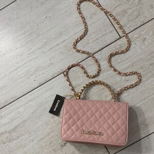 bebe Quilted Light Pink Crossbody with Gold Chain.. nwt
Authentic